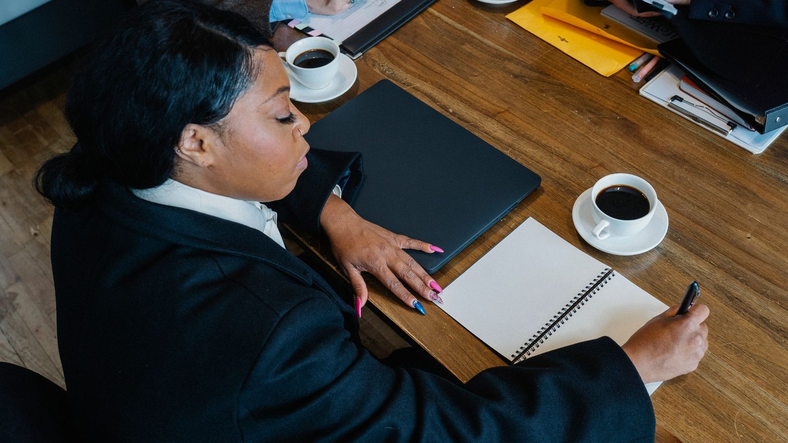 An investor making notes while reviewing an opportunity